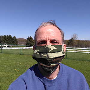 Dr. Rory Cooper wears anti-COVID mask