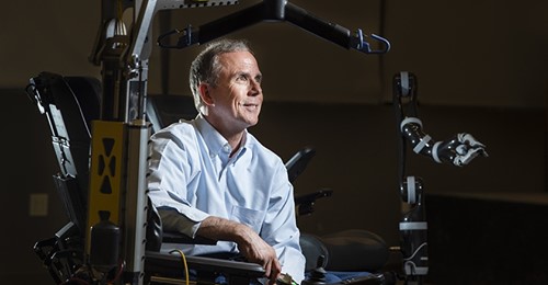 Dr. Rory Cooper seated in a robotic wheelchair